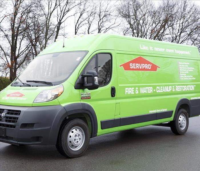 SERVPRO van with trees in the background.